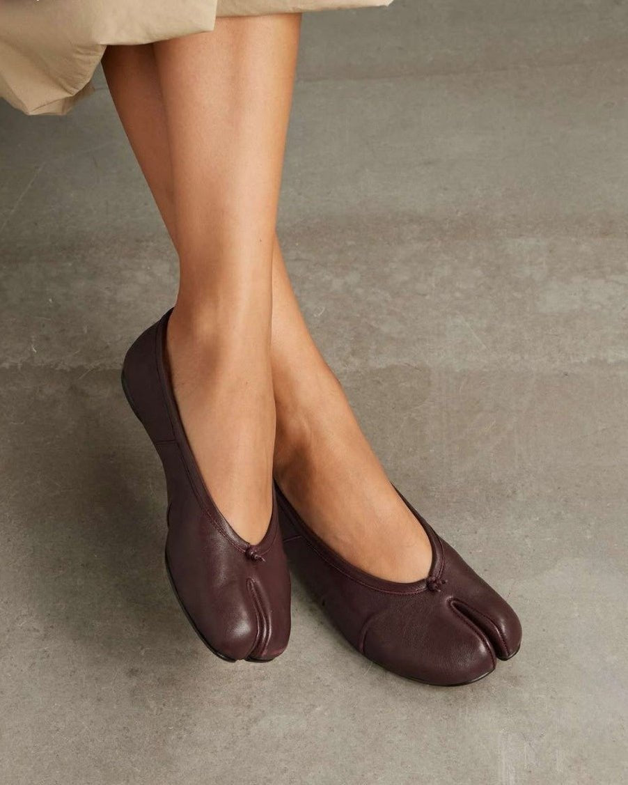 Bianca Spaltzehen-Mules aus veganem Leder