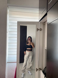 Top corto asimmetrico Celeste con ritagli